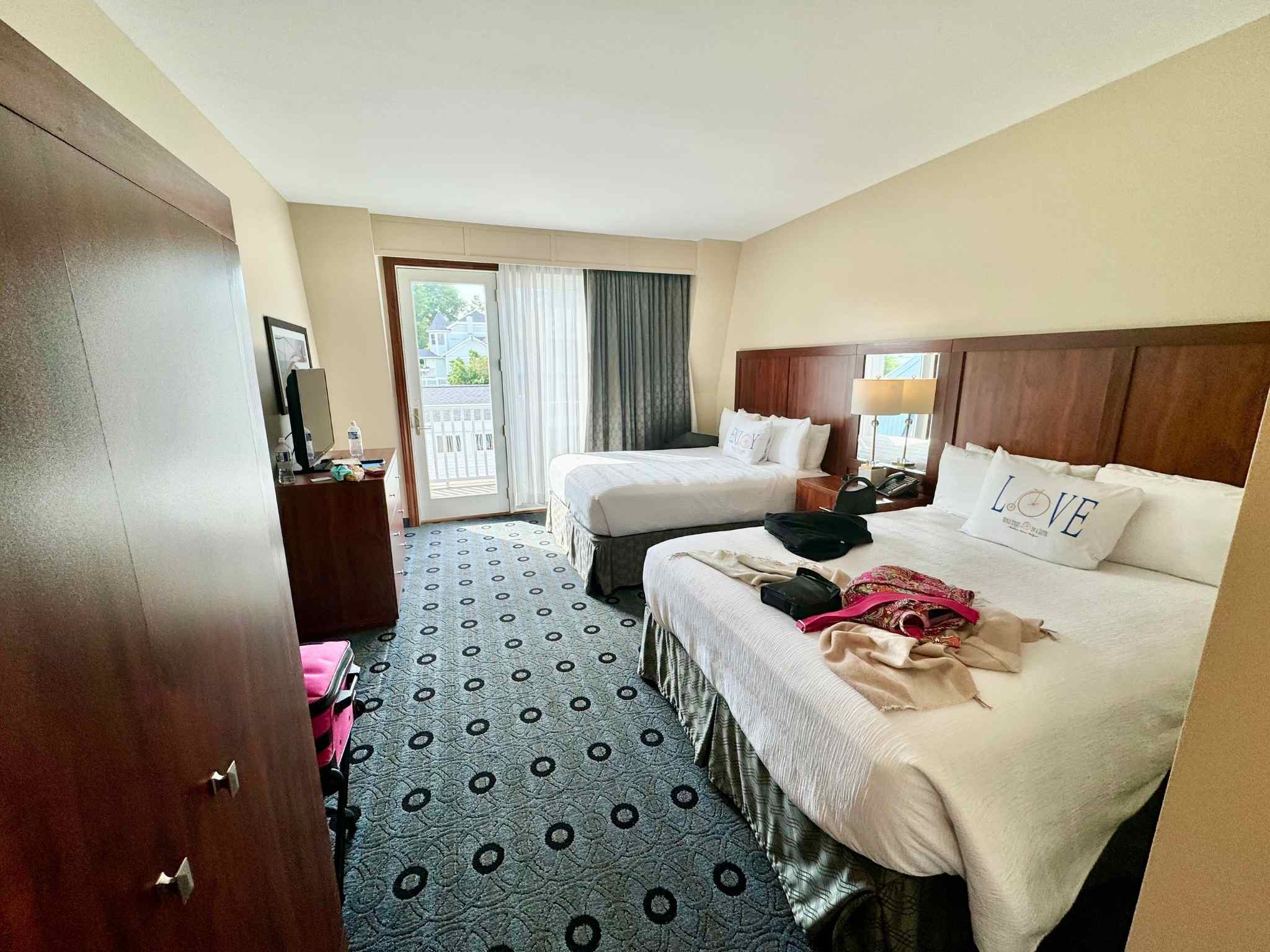 bedroom suite with balcony at bicycle inn on mackinac island