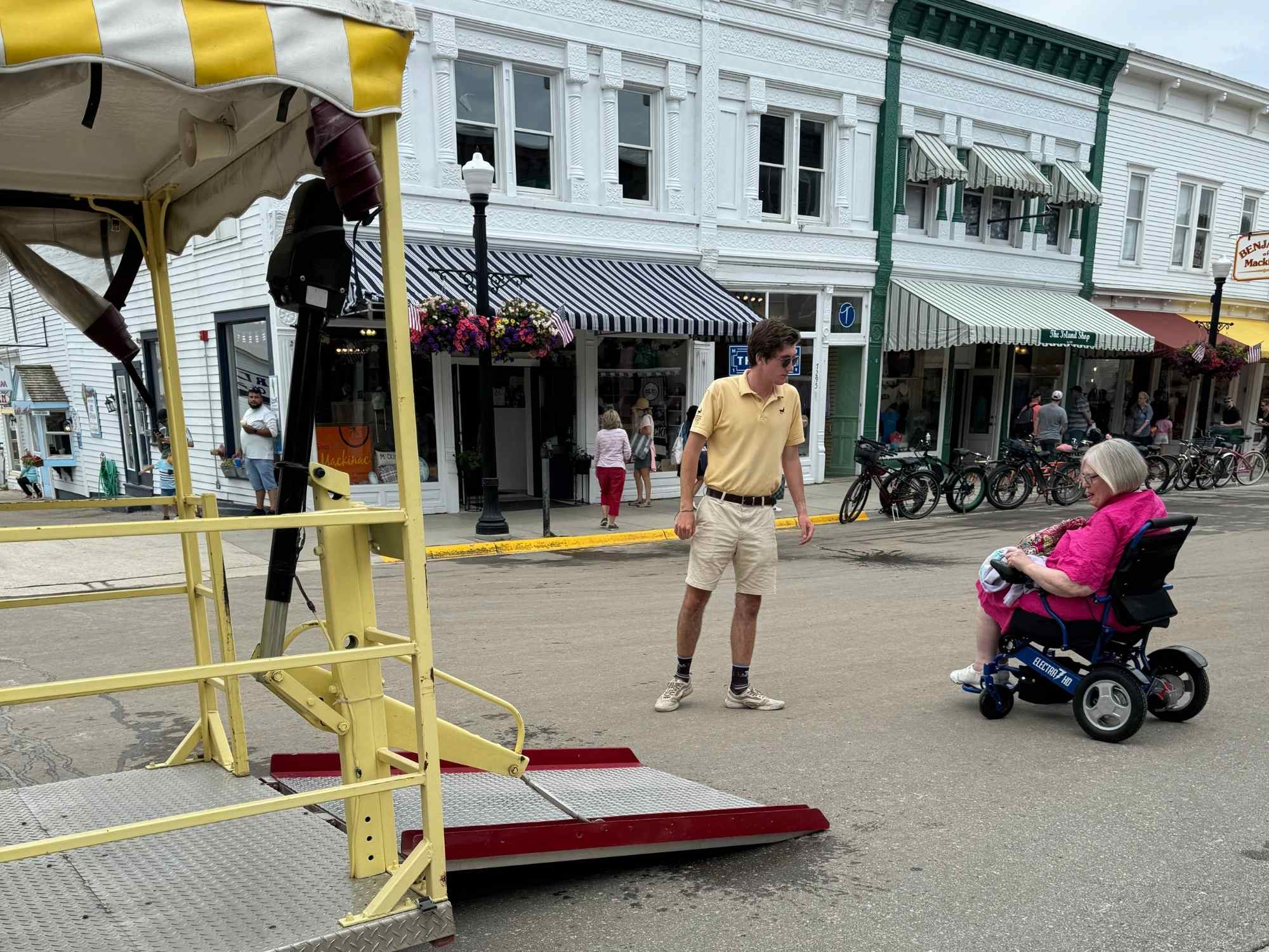 wheelchair user boarding the carriage on Mackinac Island