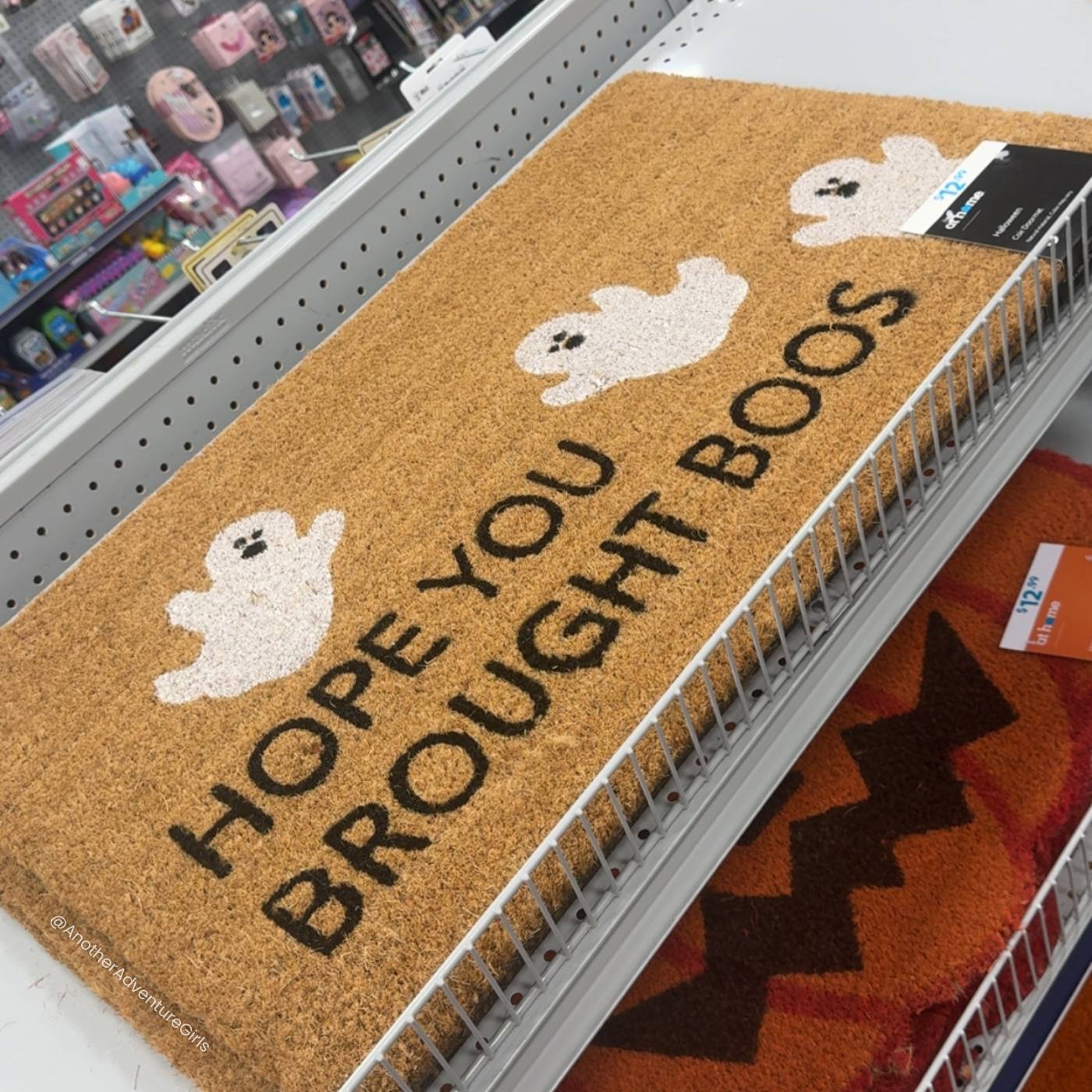 coir doormat with ghosts and copy that reads hope you brought boos