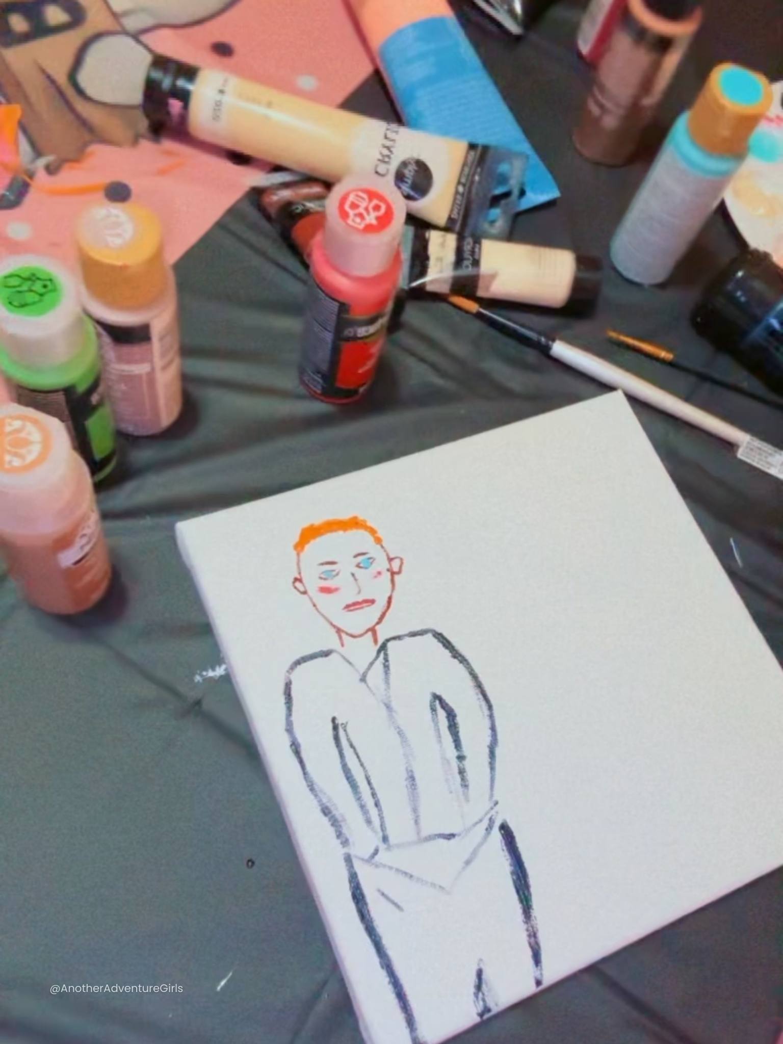 partially blank canvas with an outline of a man who has orange hair and his hands in his pockets