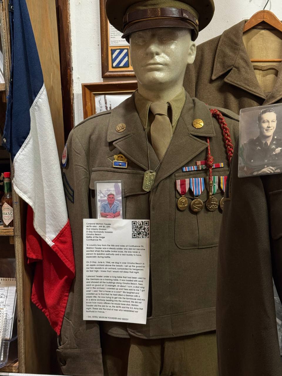 WWII vet dressed mannequin with printed info about the soldier